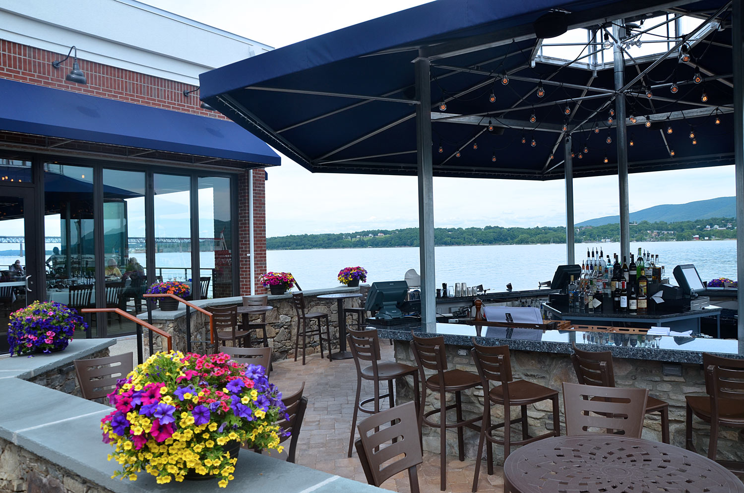 View of the outside patio bar with Hudson River in the background