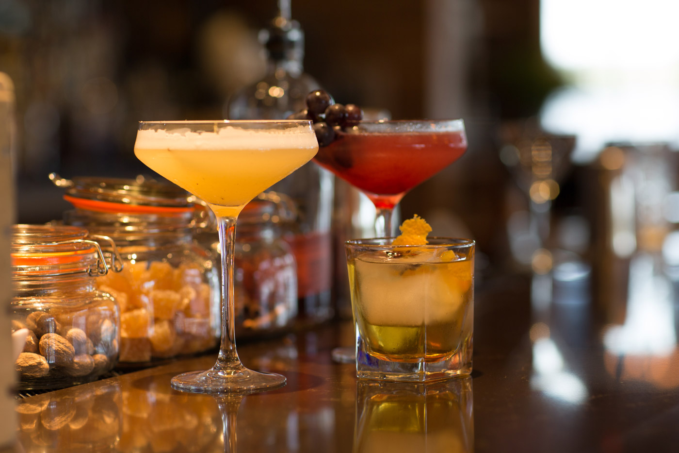Image of 3 cocktails sitting on the bar