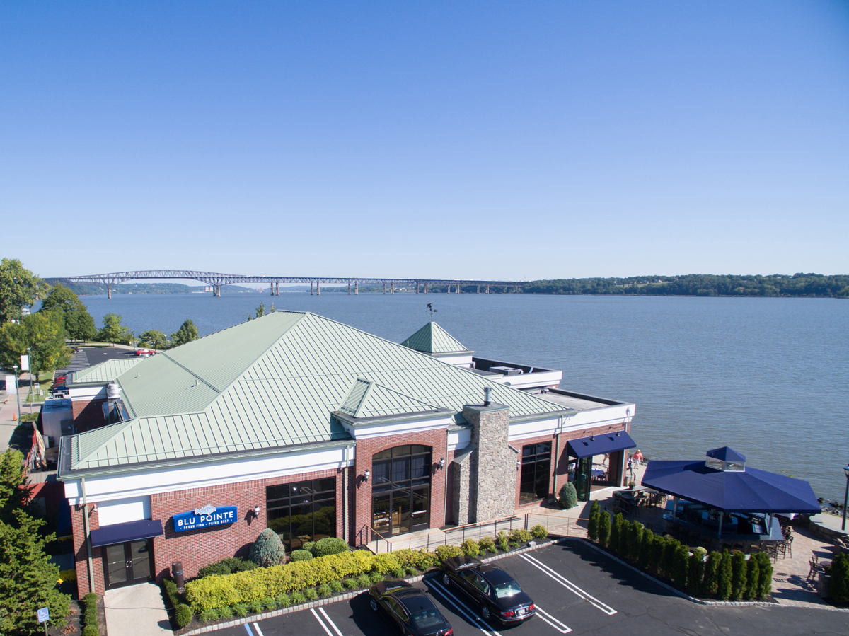 Aerial view of the Blu Pointe Restaurant facing the north with the Newburgh Beacon Bridge in the background
